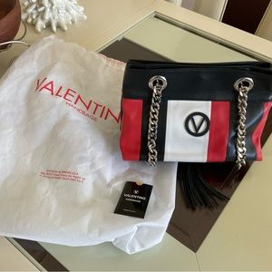 Red,black and white handbag
